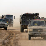 Patrouille des FAMa sur un axe routier lors d’une opération de sécurisation.